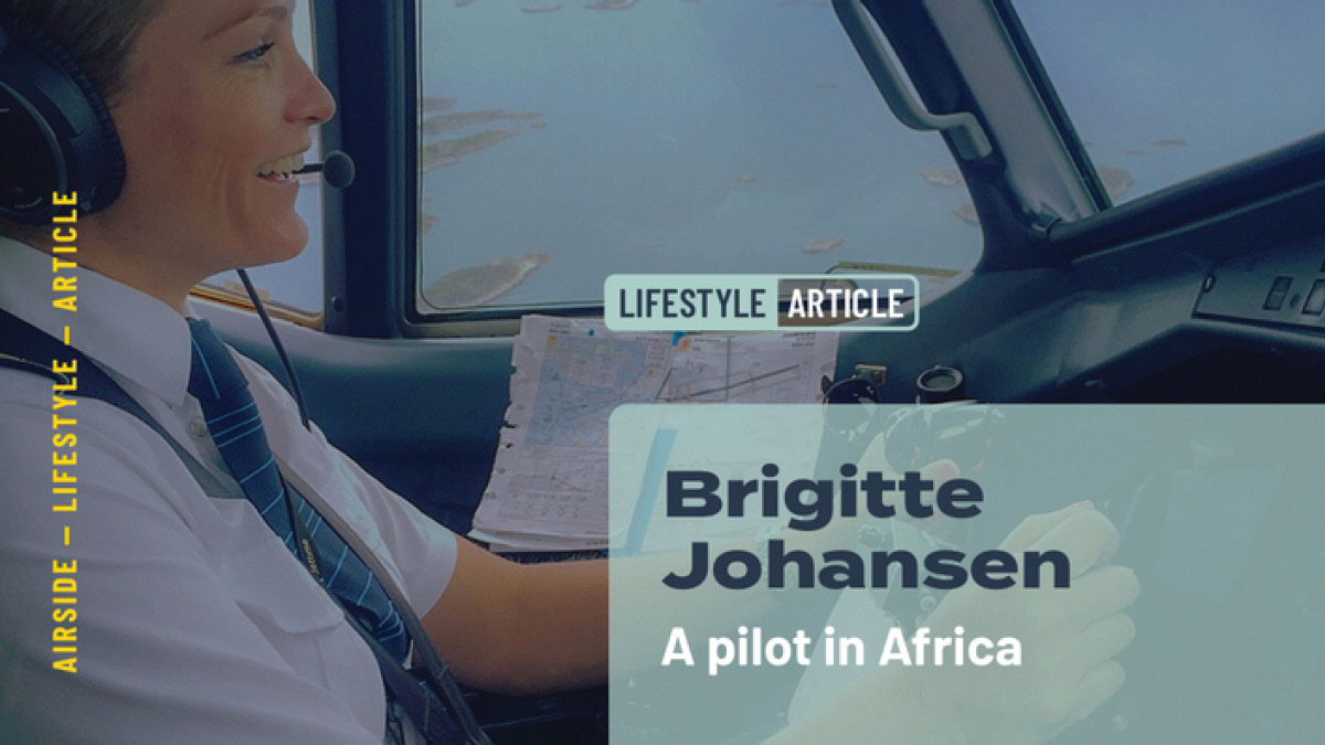 Pilot in cockpit flying plane over Africa